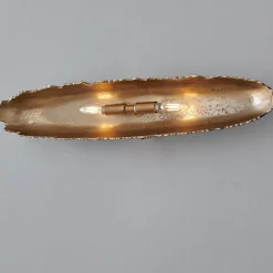 Oumaumau Sconce